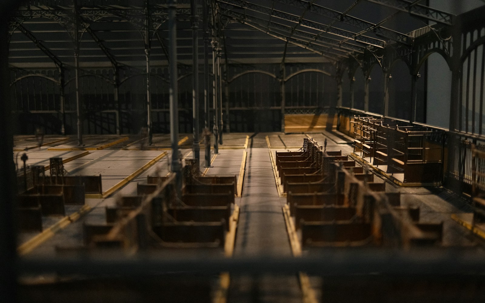 A handmade miniature room diorama with warm hidden LED lighting, a removable back panel, and fine wires routed beneath the base.